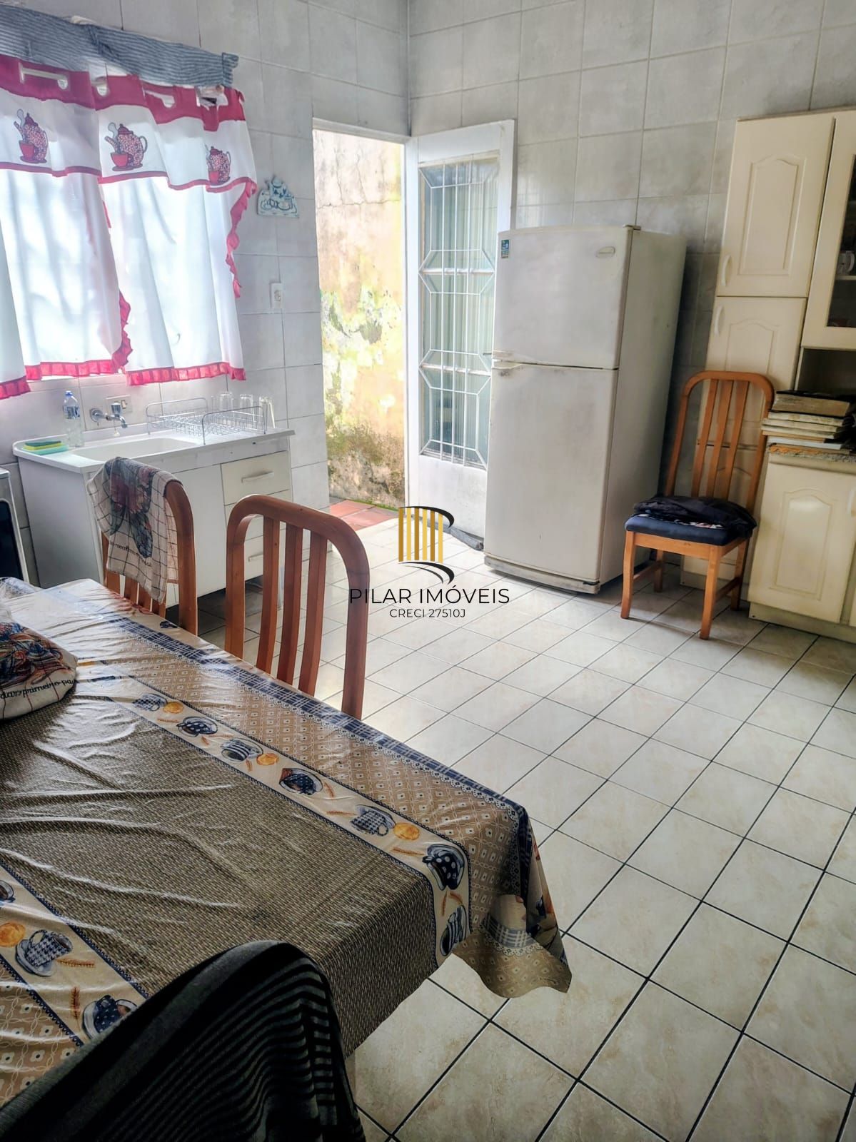 Casa em condomínio fechado no bairro Cristal em Porto Alegre/RS