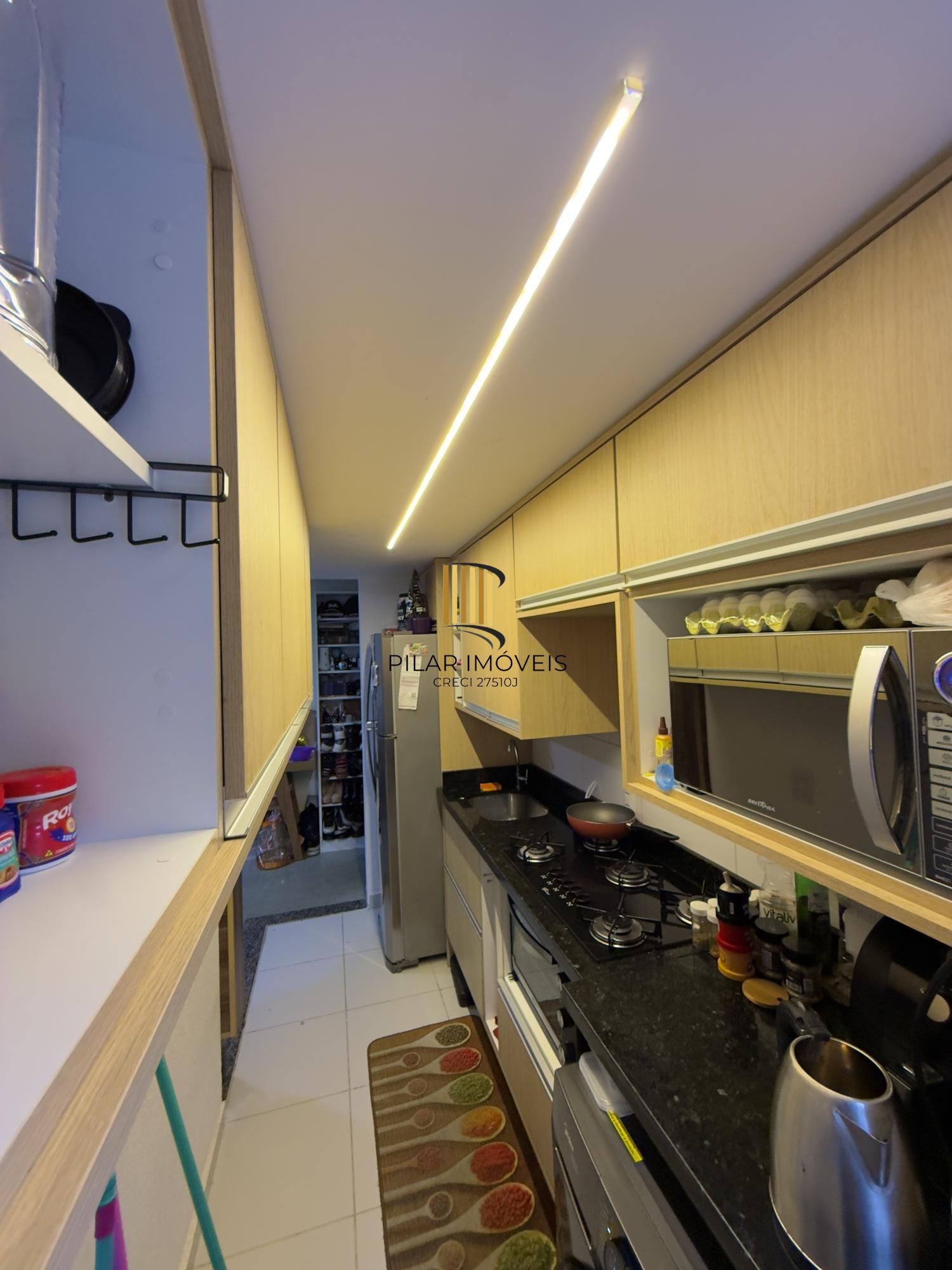 APARTAMENTO COM 2 QUARTOS VAGA ESCRITURADA E ELEVADOR, BAIRRO VILA NOVA, Poa-RS