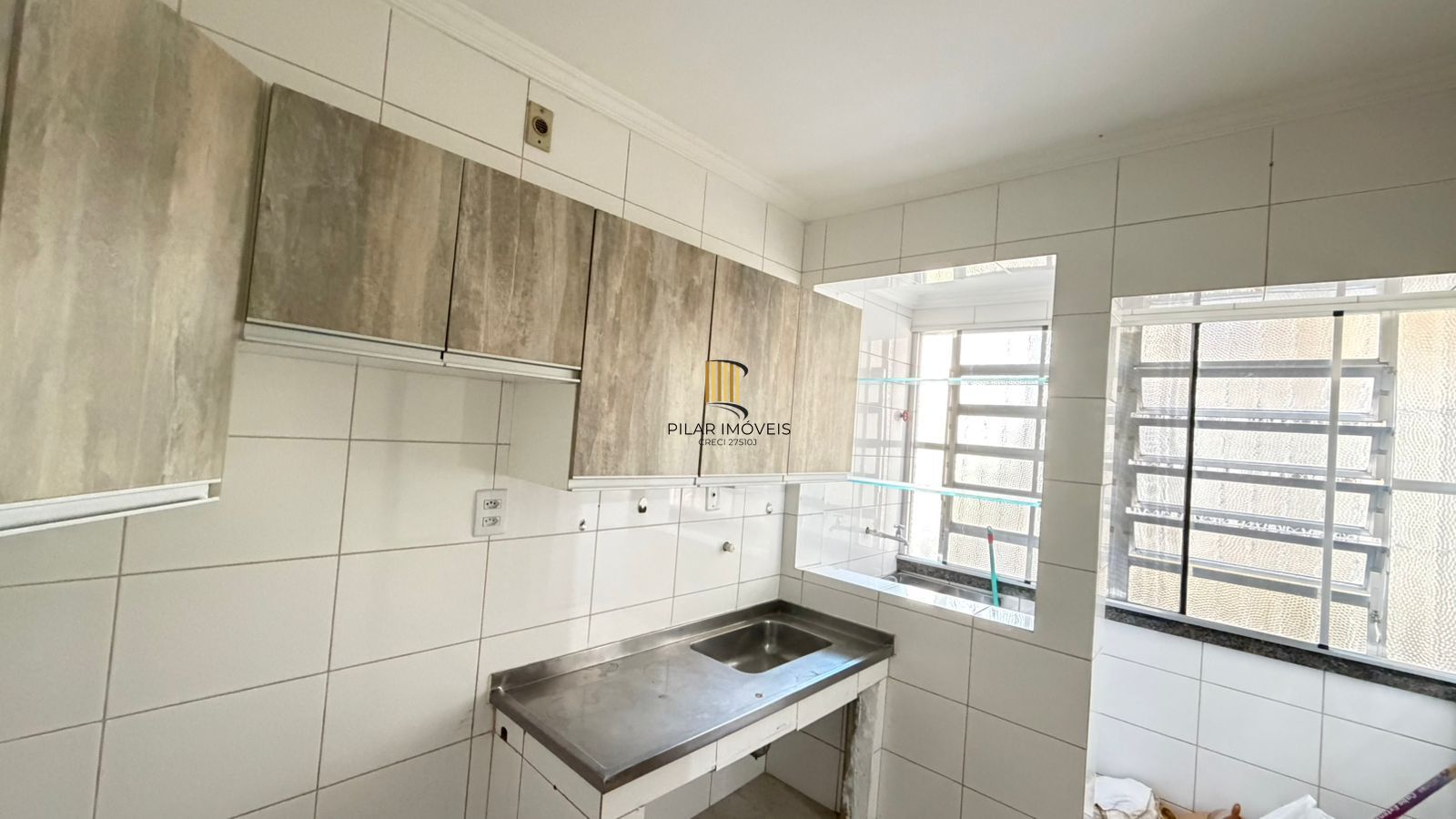 Apartamento de 2 dormitórios com vista para o Marinha no bairro Menino Deus em Porto Alegre/RS