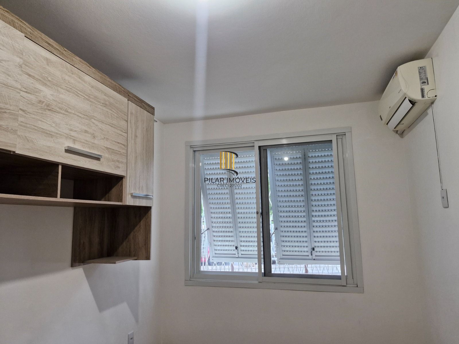 Apartamento de 2 dormitórios com vista para o Marinha no bairro Menino Deus em Porto Alegre/RS