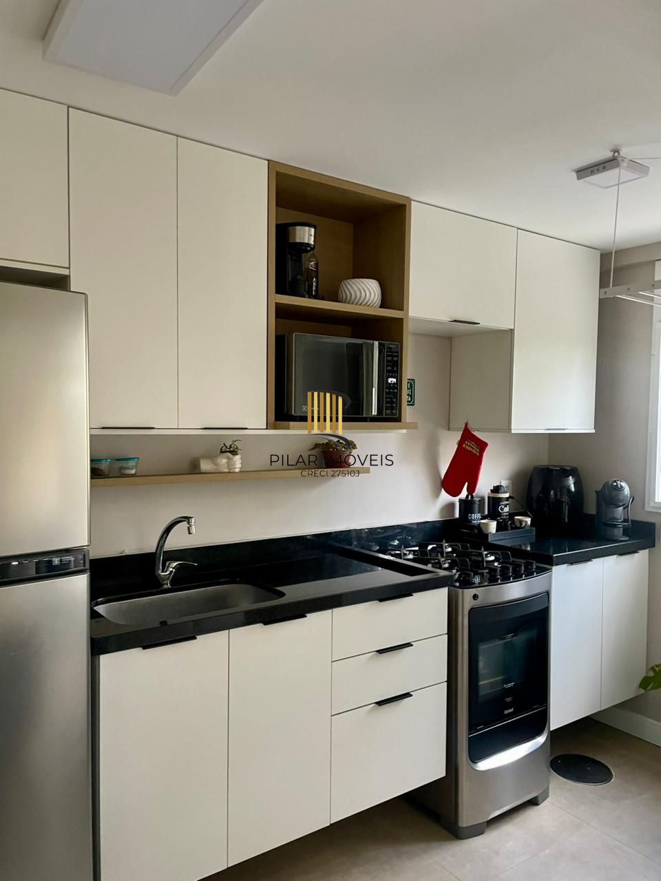 Apartamento com 02 quartos e 01 vaga escriturada no Bairro Cavalhada
