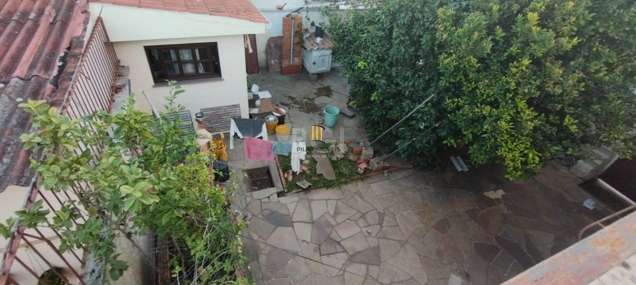 Casa de 4 dormitórios no bairro Parque Santa Fé