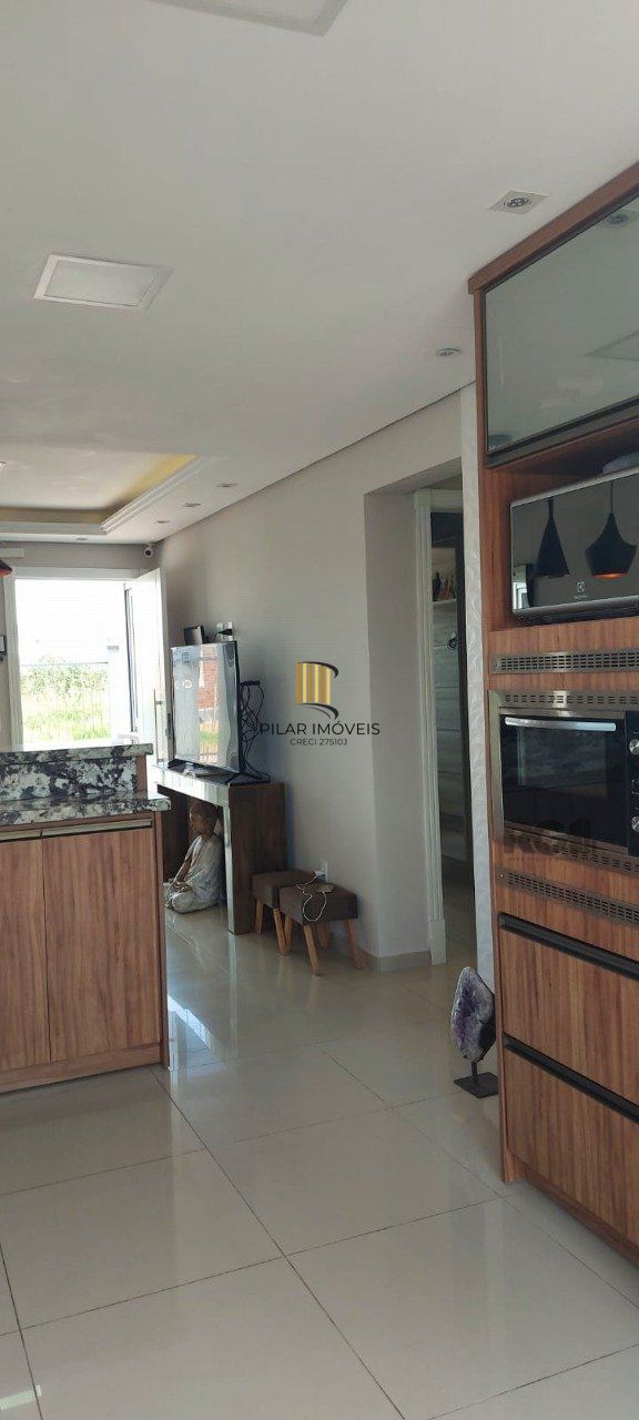 Casa com 2 dormitórios, sendo 1 suíte no bairro Florida em Guaíba