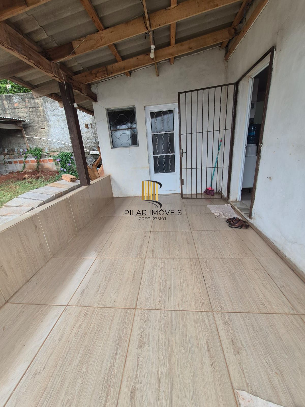 Belíssima casa de 2 dormitórios com um amplo pátio na cidade de Passo Fundo