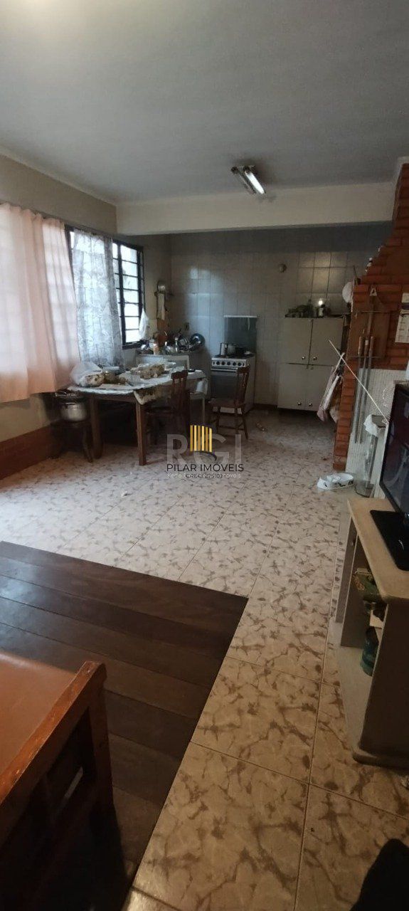 Casa de 4 dormitórios no bairro Parque Santa Fé