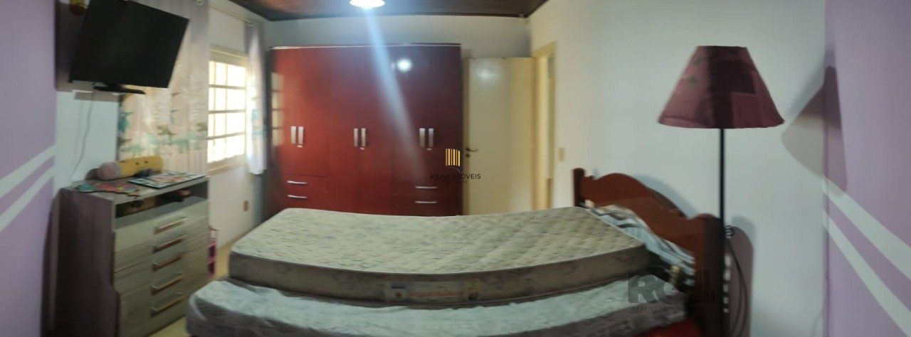casa com 4 dormitórios, sendo 1 suíte, garagem para dois carros fechada, no bairro Santa Isabel em Viamão