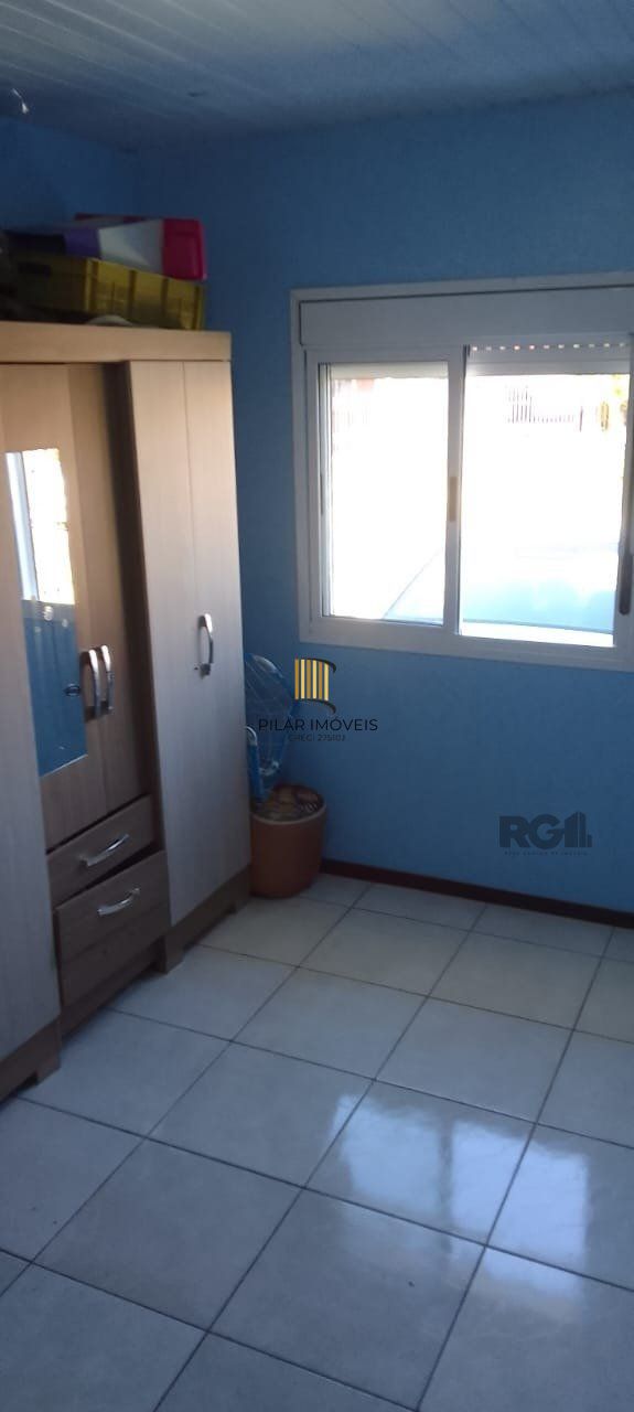 Casa com 2 quartos, 2 vagas de garagem, no bairro Fortuna, Sapucaia do Sul/RS