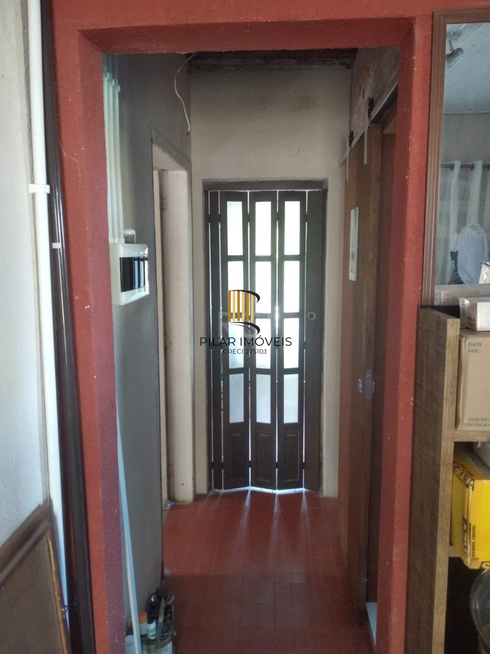 Casa 2 dormitórios, sala, banheiro garagem coberta, terreno 694m² bairro Camaquã, Porto Alegre/RS
