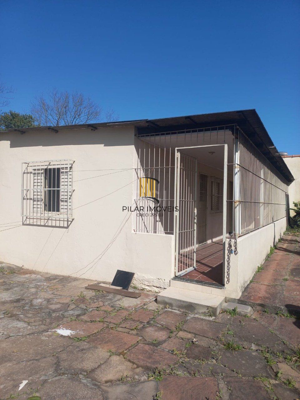 Duas casas no mesmo terreno no bairro Rubem Berta - Pilar Imóveis