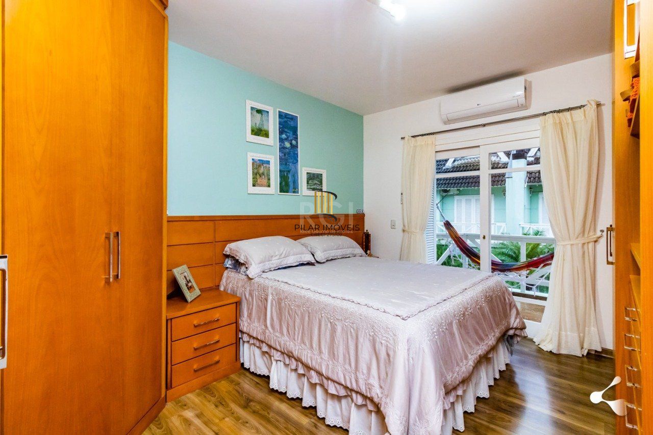 CASA 4 DORMITÓRIOS COM GARDEM NO GUARUJA - PORTO ALEGRE - RS
