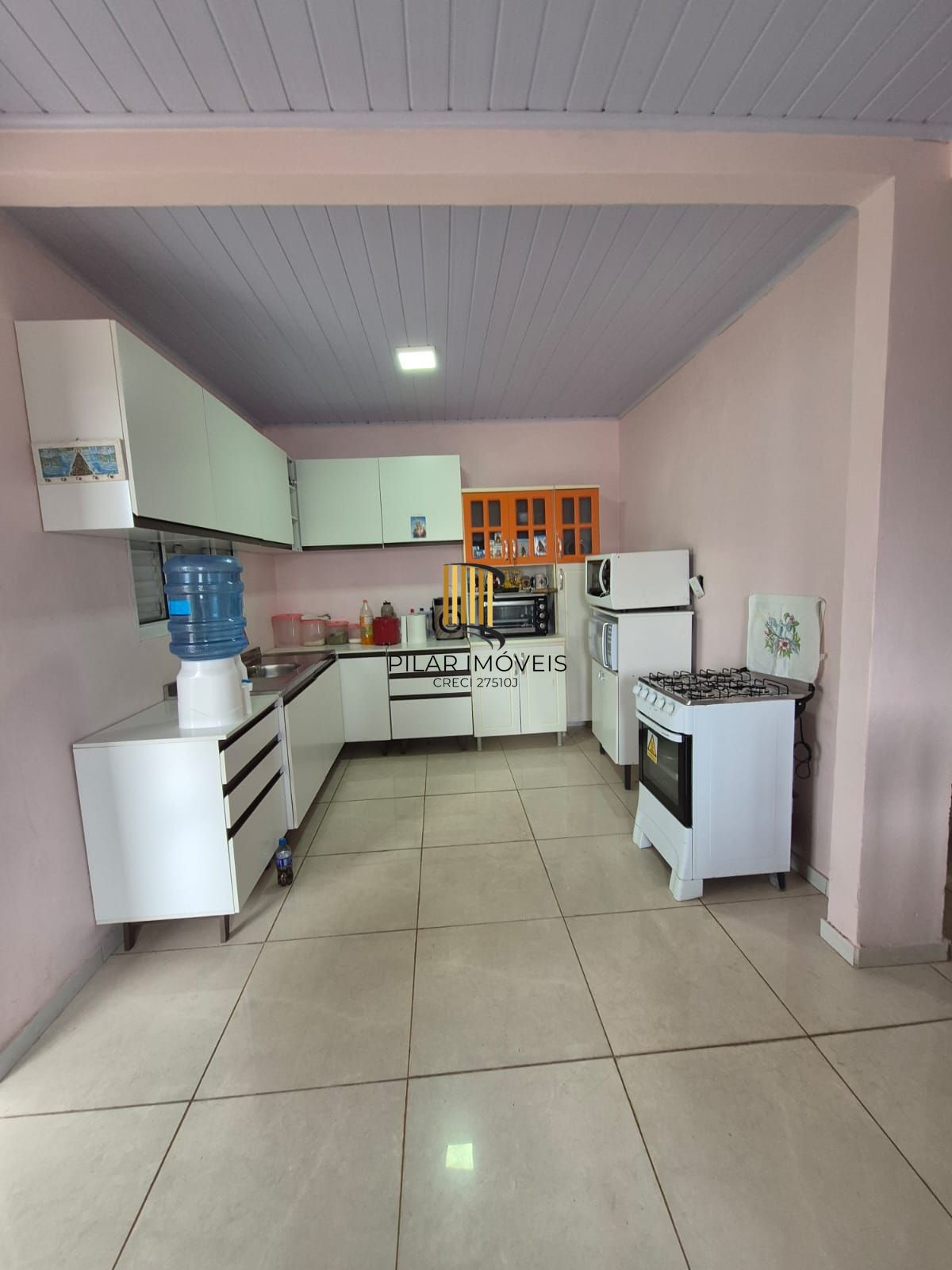 Belíssima casa de 2 dormitórios com um amplo pátio na cidade de Passo Fundo