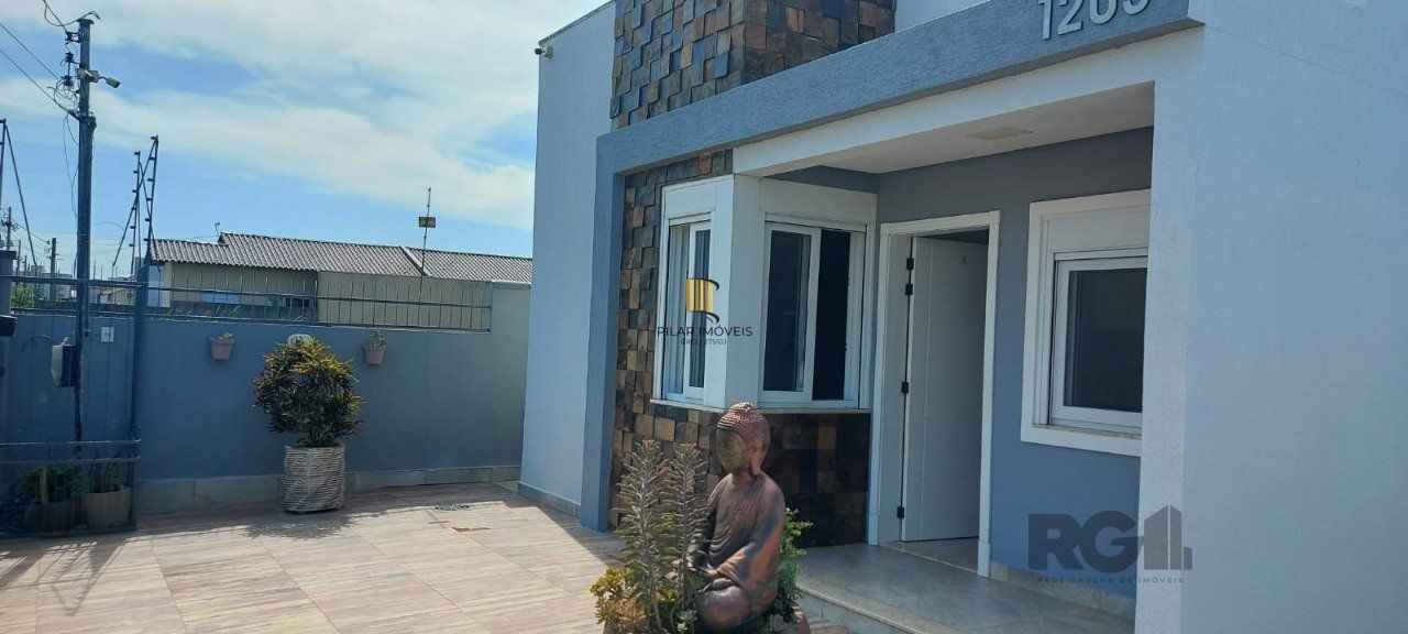 Casa com 2 dormitórios, sendo 1 suíte no bairro Florida em Guaíba