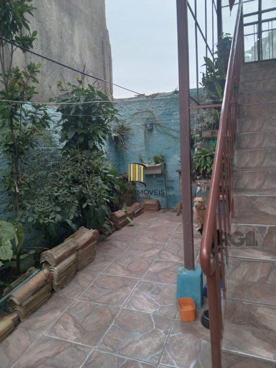 Casa com 3 quartos, vaga de garagem, churrasqueira, no bairro Partenon, Porto Alegre/RS