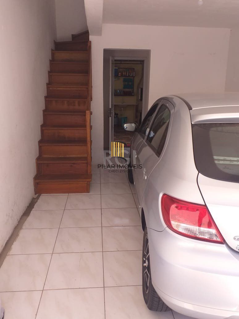 Casa com 2 quartos, banheiro, área de serviço, cozinha, vaga de garagem, no bairro Aberta dos Morros/RS