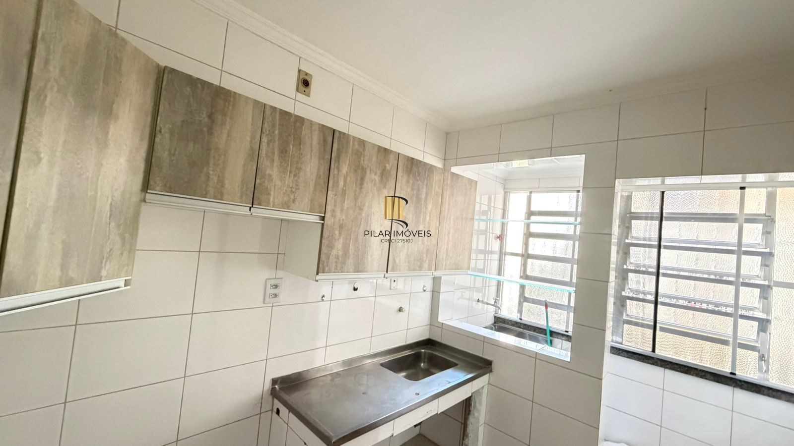 Apartamento de 2 dormitórios com vista para o Marinha no bairro Menino Deus em Porto Alegre/RS