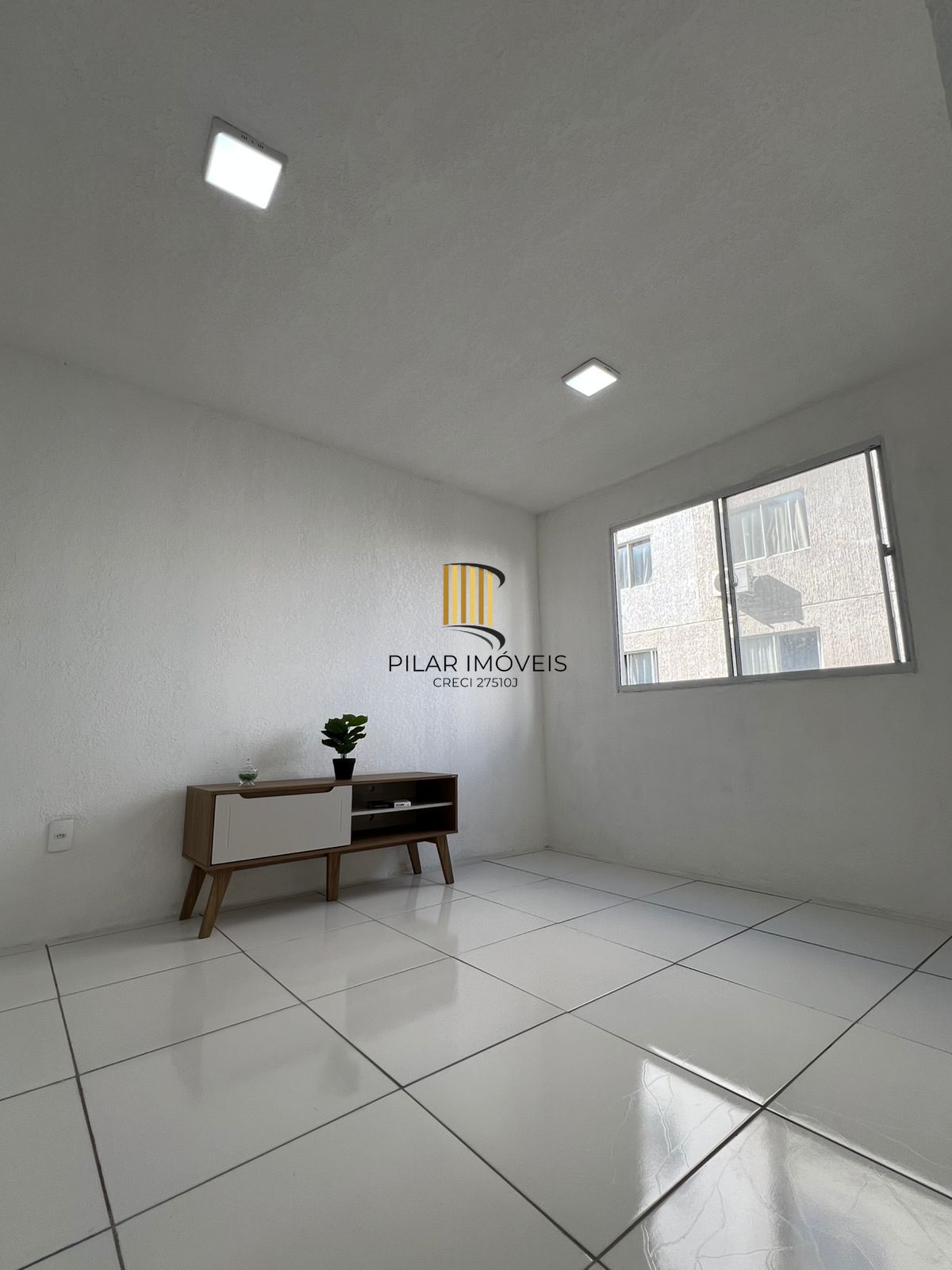 Apartamento Térreo com 02 quartos e 01 vaga no Bairro Restinga em Porto Alegre