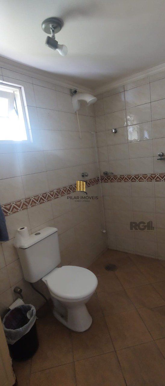 casa com 4 dormitórios, sendo 1 suíte, garagem para dois carros fechada, no bairro Santa Isabel em Viamão