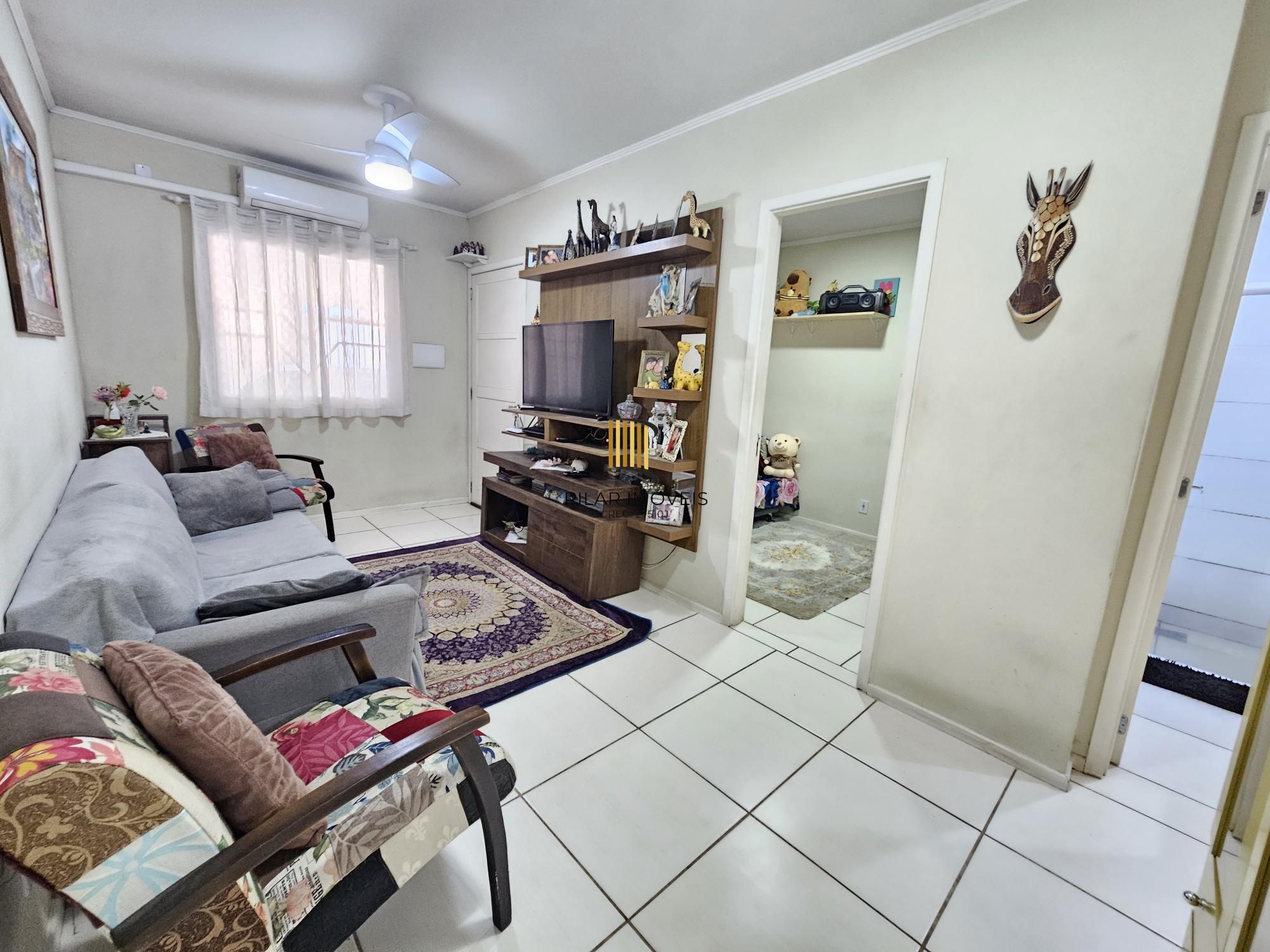 Oportunidade Única! Casa Residencial com 2 Quartos, 2 Banheiros e 2 Vagas de Garagem em Cachoeirinha, Rio Grande do Sul**