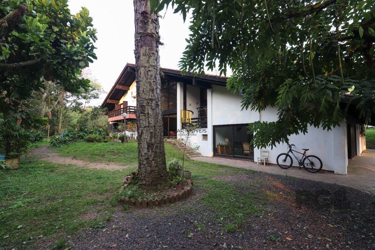 Casa para Venda - 523.36m², 6 dormitórios, sendo 2 suites, 2 vagas - Vila Conceição, Porto Alegre