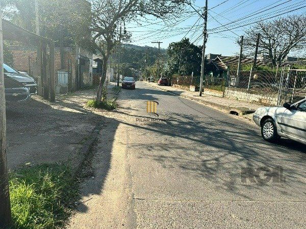 Terreno com 66m² e casa mista, no bairro Vila Nova