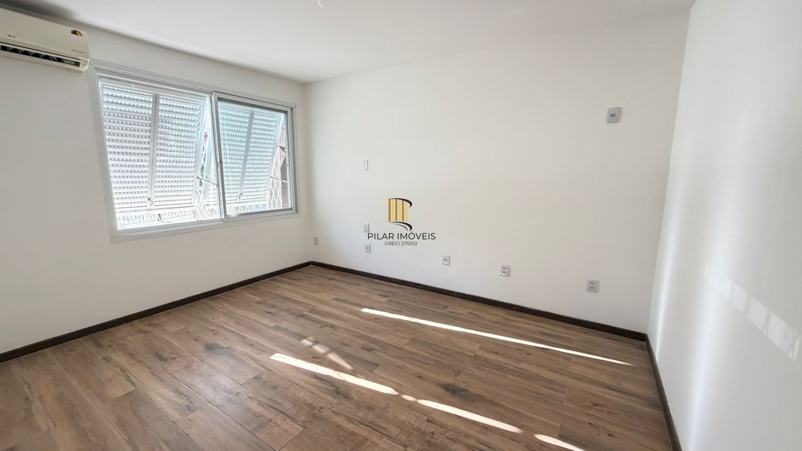 Apartamento de 2 dormitórios com vista para o Marinha no bairro Menino Deus em Porto Alegre/RS