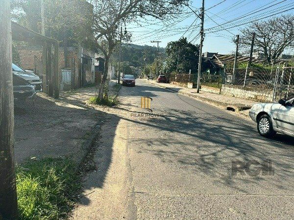 Terreno com 66m² e casa mista, no bairro Vila Nova