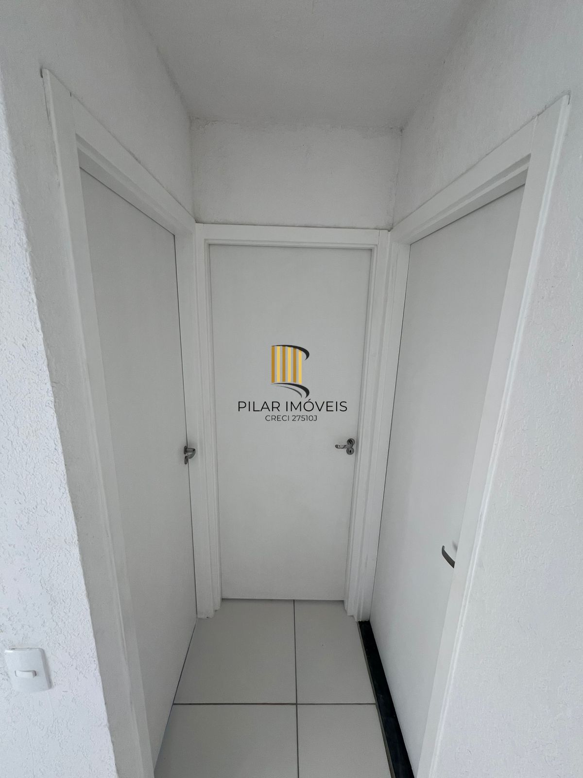 Apartamento Térreo com 02 quartos e 01 vaga no Bairro Restinga em Porto Alegre