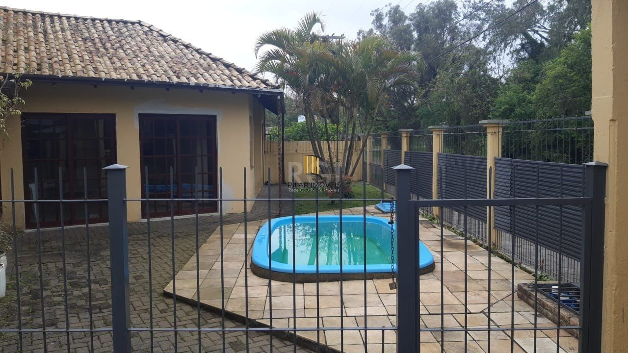 Casa em condomínio com 168,03m² com 3 dormitórios, 1 suíte, vagas de garagem, no bairro Serraria