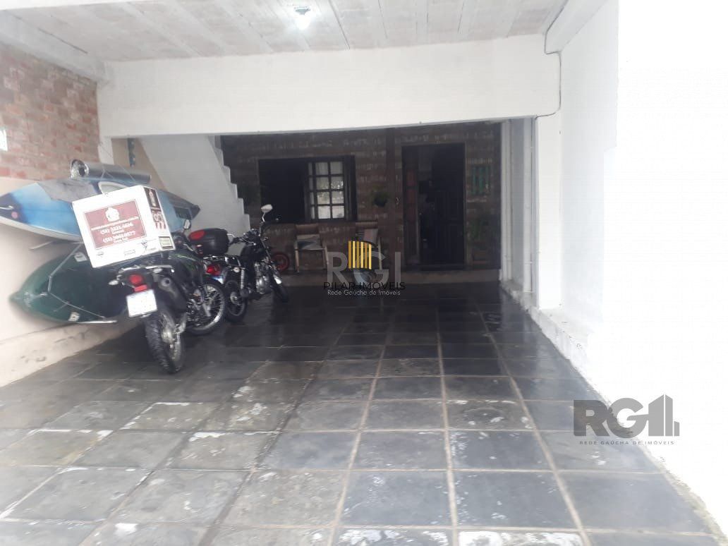 Casa com 3 dormitórios, sendo 1 suíte no bairro Hípica