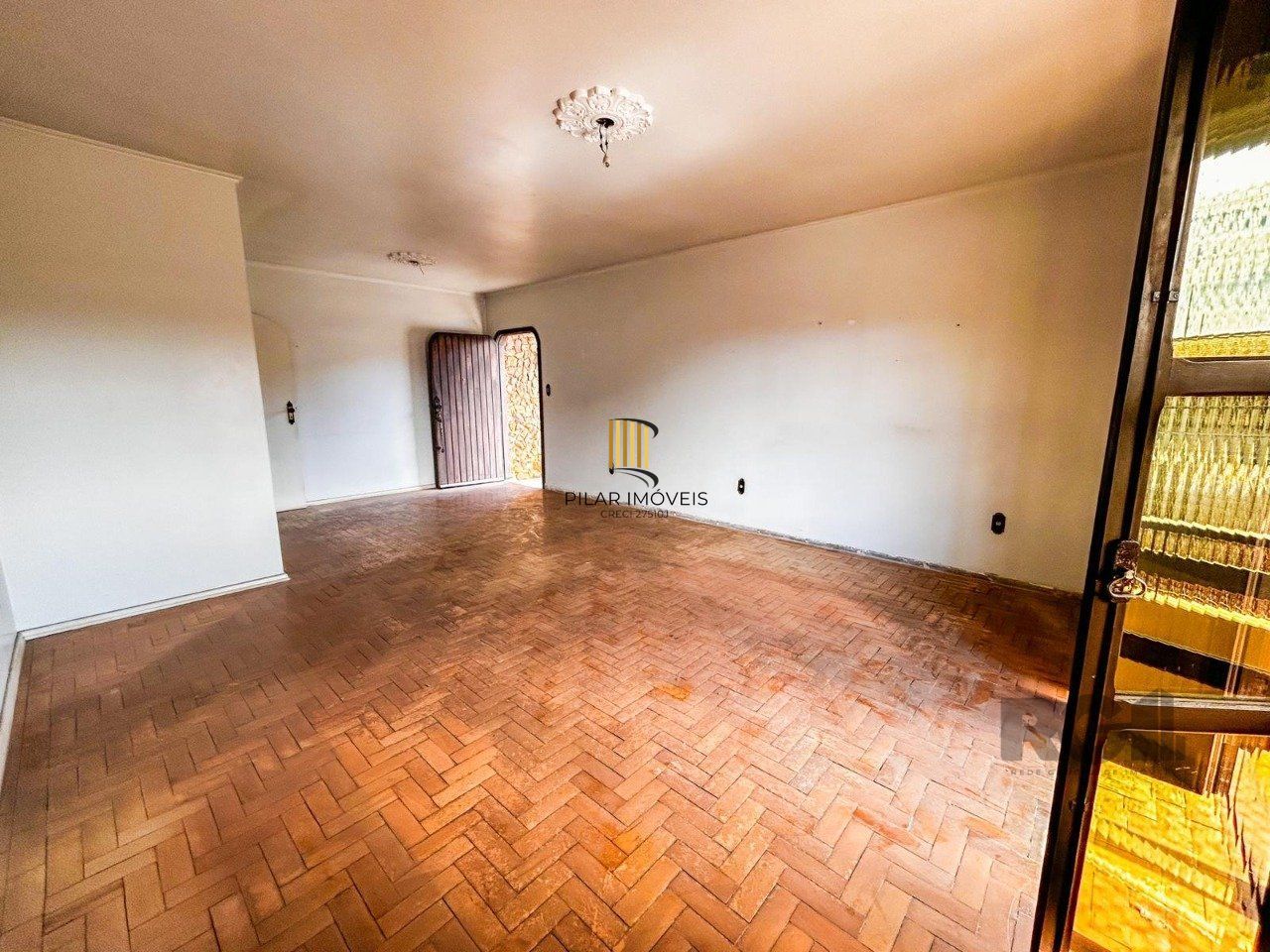Casa de 3 dormitórios, 1 suíte, garagem fechada, churrasqueira, no bairro Cavalhada Porto Alegre/RS