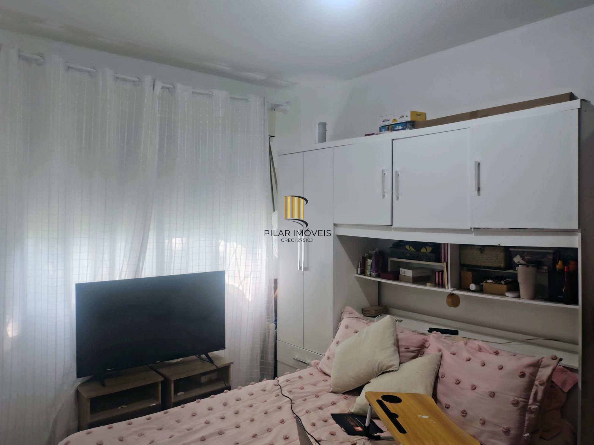 Apartamento dois dormitórios com vaga rotativa Santo Antônio - Porto Alegre