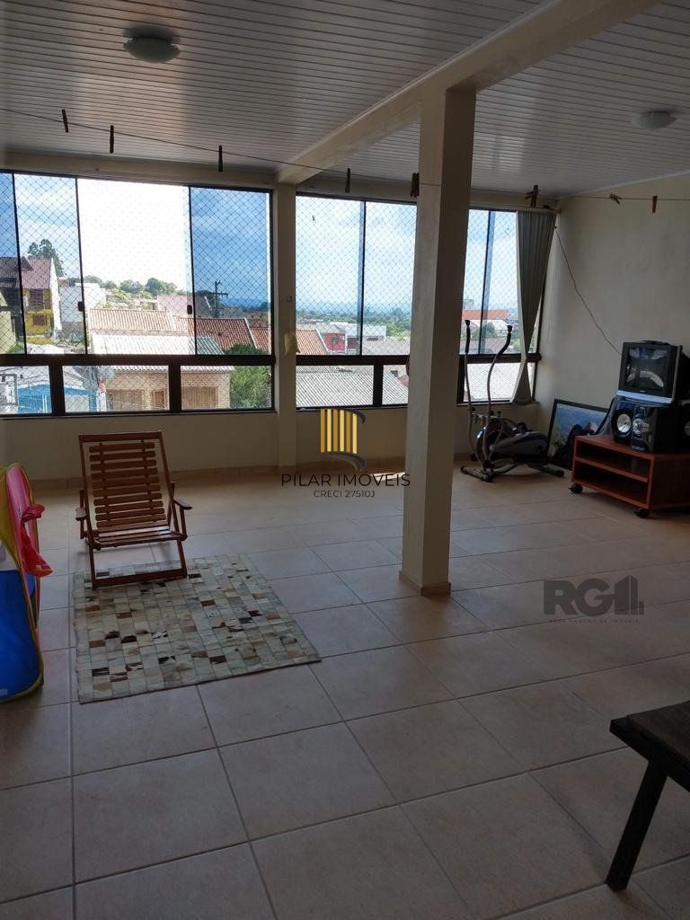 Casa com 3 quartos, 4 vagas de garagem, salão de festa, sacada 198m² no bairro Rubem Berta, Porto Alegre/RS