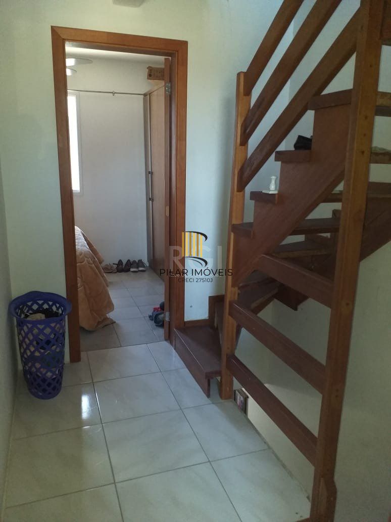 Casa com 2 quartos, banheiro, área de serviço, cozinha, vaga de garagem, no bairro Aberta dos Morros/RS