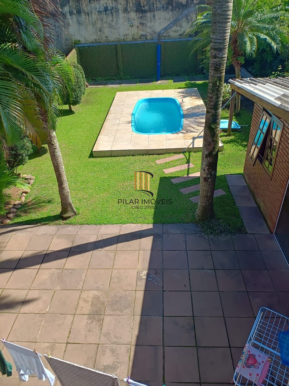CASA COM PISCINA NA TRISTEZA