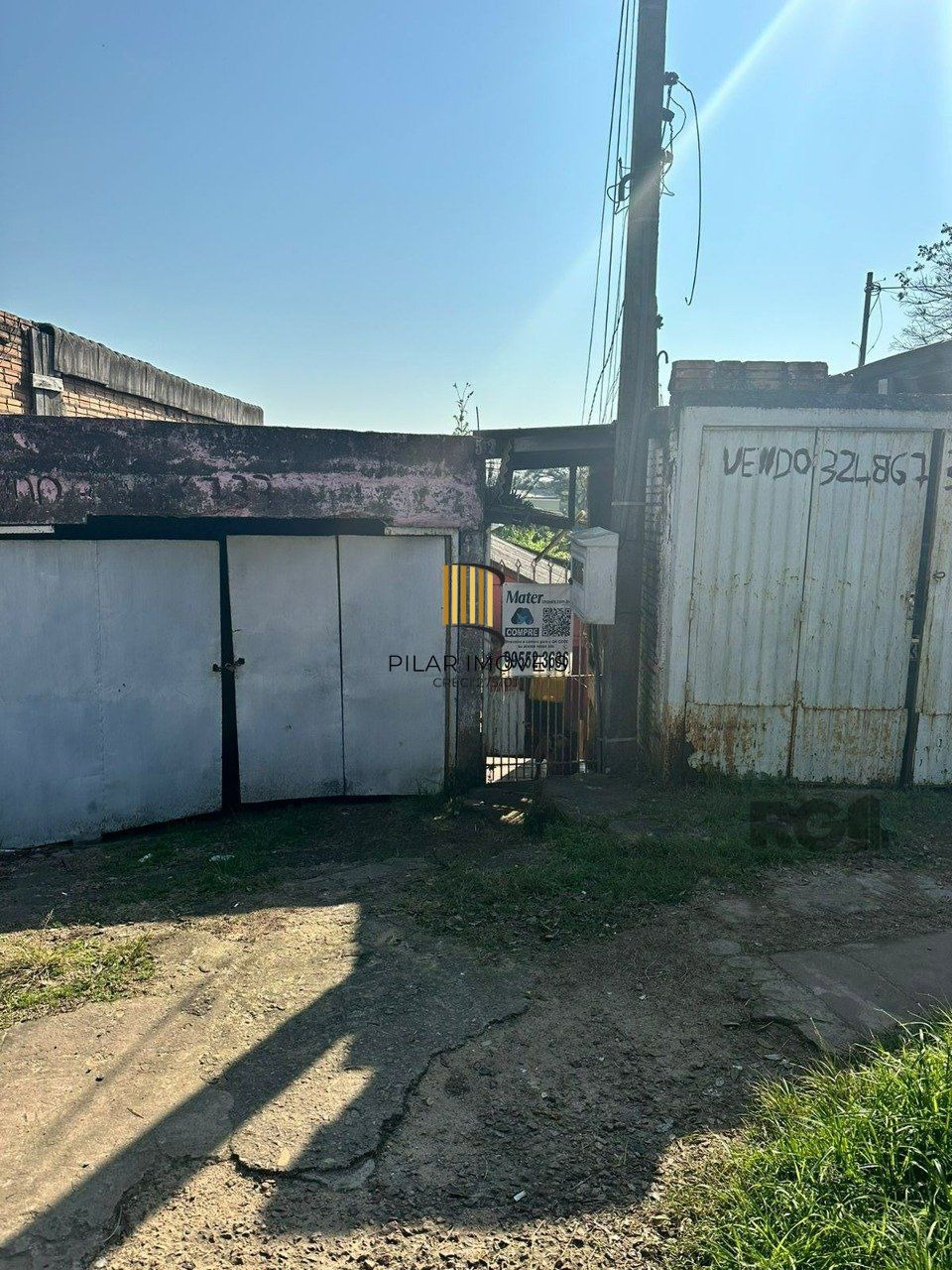 Terreno com 66m² e casa mista, no bairro Vila Nova