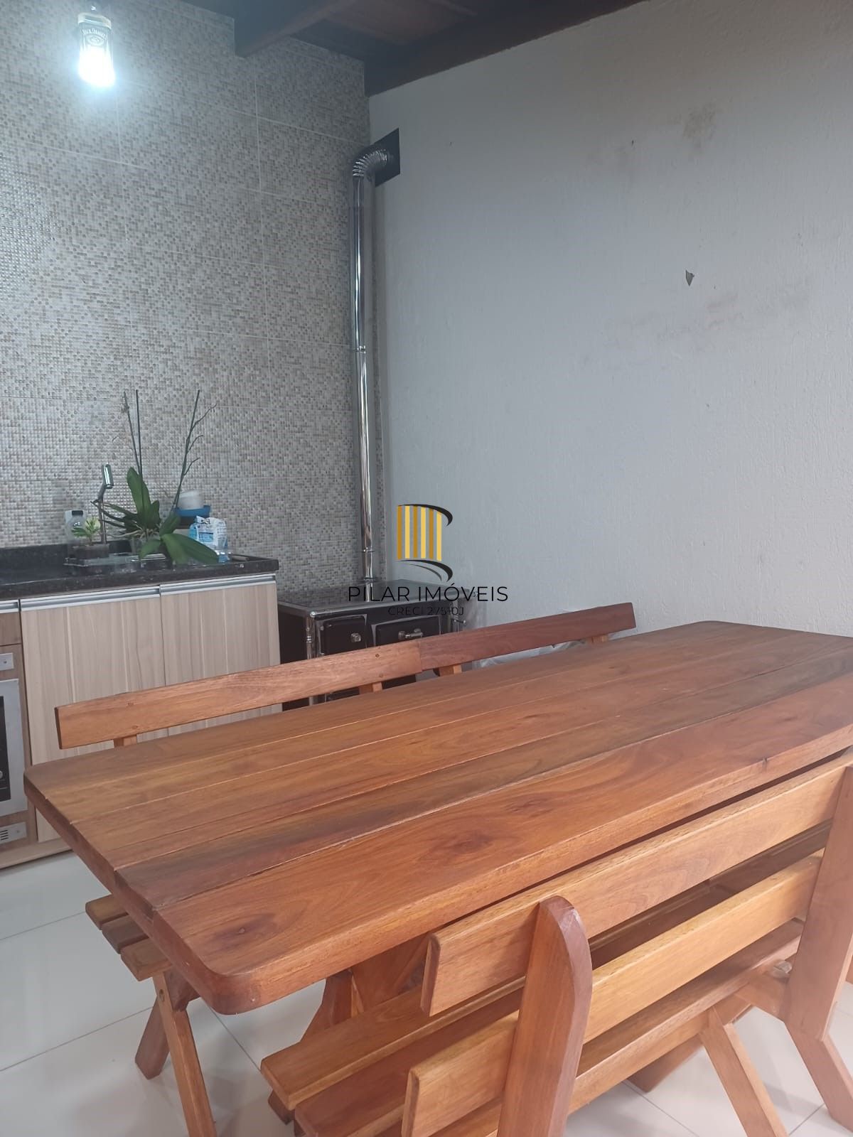 Casa 3 dormitórios no bairro Guarujá - Pilar Imóveis