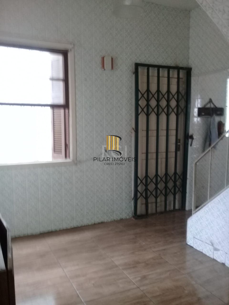 Casa de 4 dormitórios na Av. Teresópolis bairro Teresópolis