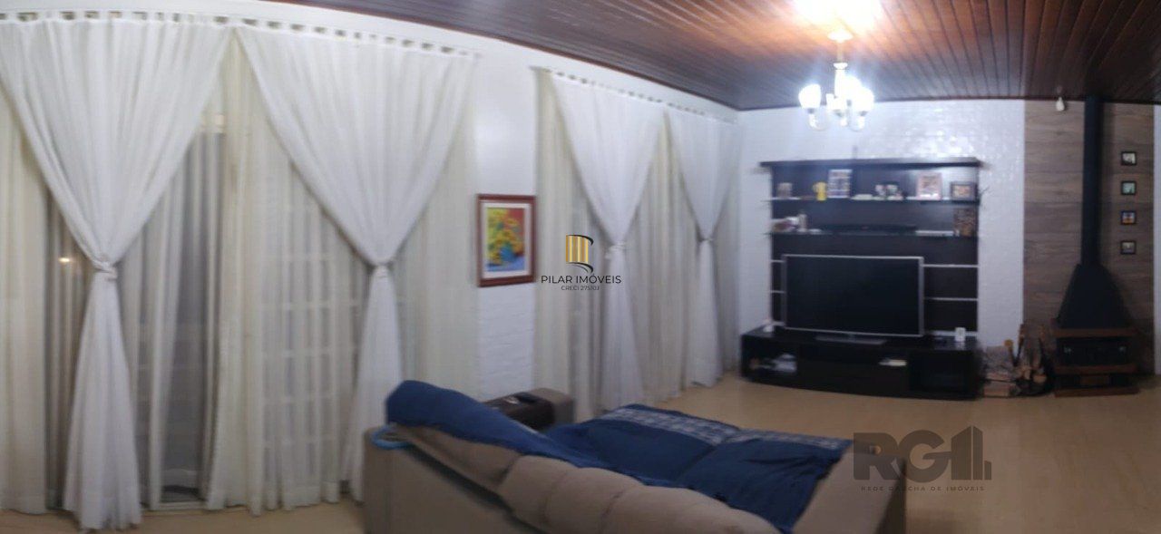 casa com 4 dormitórios, sendo 1 suíte, garagem para dois carros fechada, no bairro Santa Isabel em Viamão