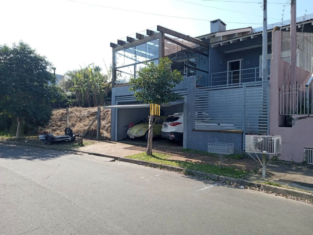 Linda casa no VERDES CAMPOS COM 2 DORMITÓRIOS SENDO 1 SUÍTE e closet, lareira living amplo - Amplo pátio com piscina. - Pilar Imóveis