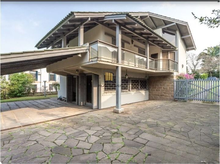 Casa de Condomínio 3 dormitórios no bairro Cavalhada