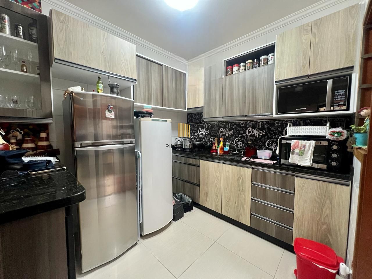 Casa em condomínio 2 dormitórios sem um com closet, vaga coberta, no bairro Cel. Aparicio Borges.