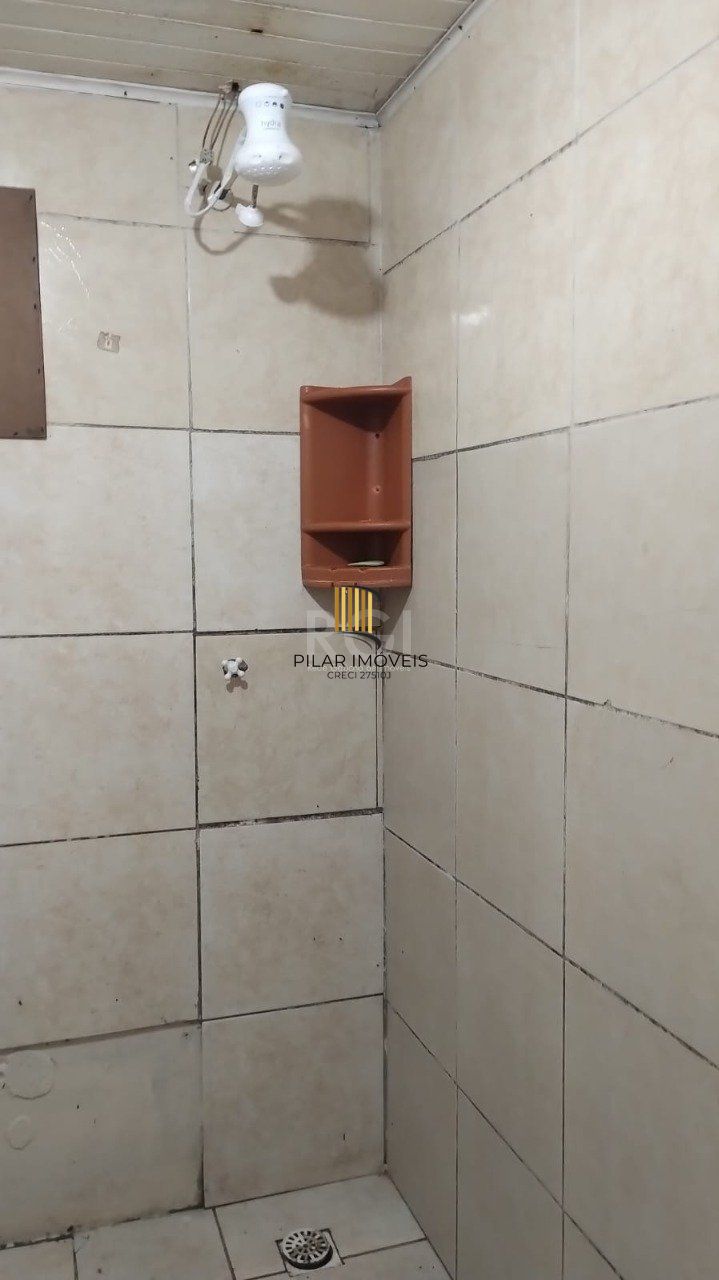 Terreno com 3 casas no pátio bairro  São Francisco TRAMANDAÌ/RS