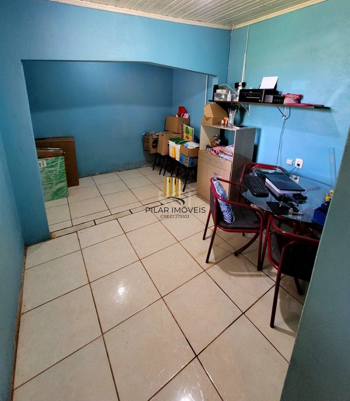 Casa com 3 quartos, 1 suíte, vaga de garagem, varanda, no bairro Hilda, Cruz Alta/RS