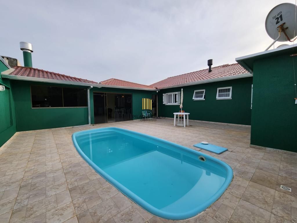 Casa 3 dormitórios, 1 suite, lareira, 2 vagas de garagem, piscina, bairro Mariápolis, Osório-RS