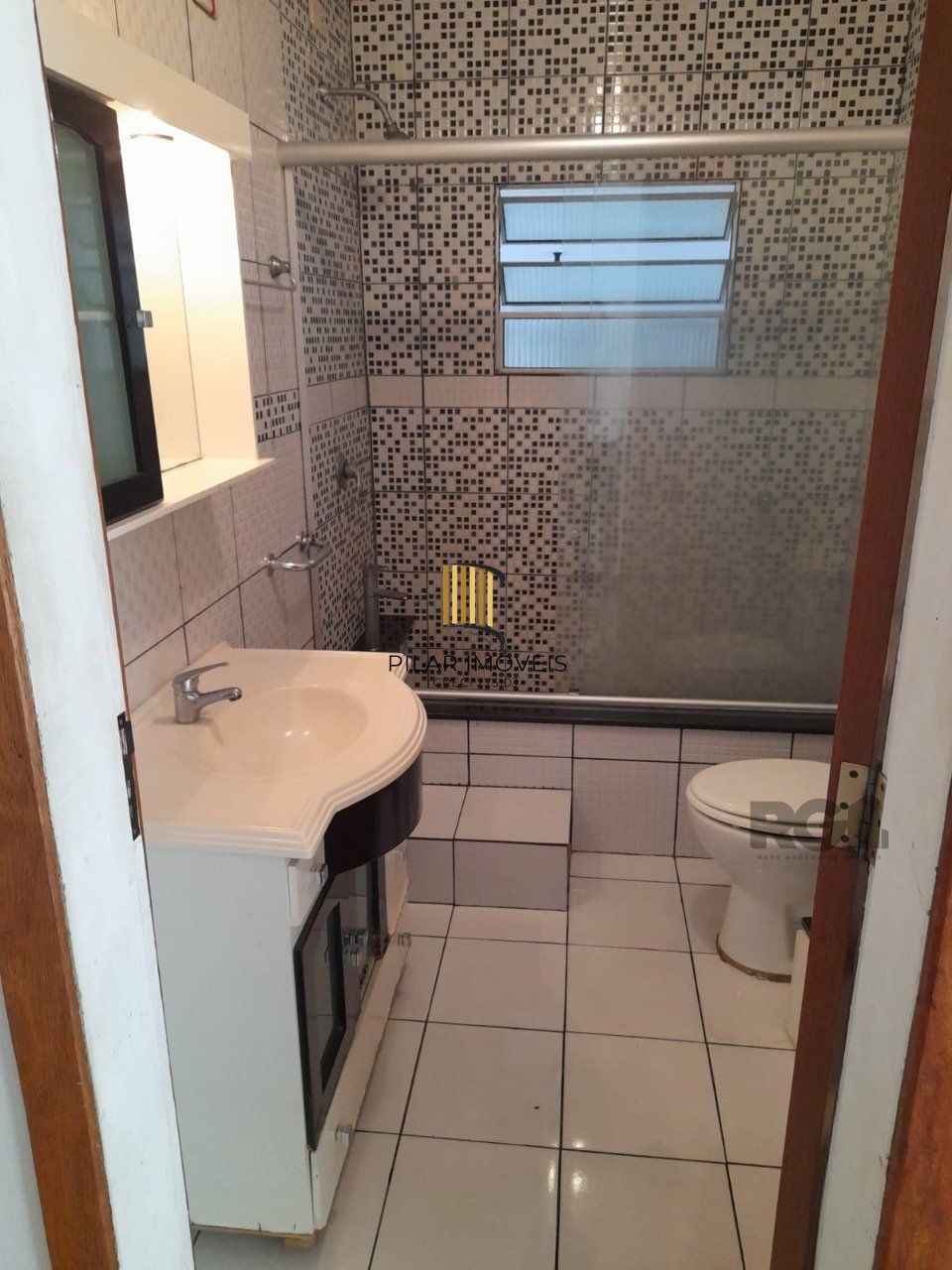 Casa de 3 dormitórios no bairro Santa Tereza