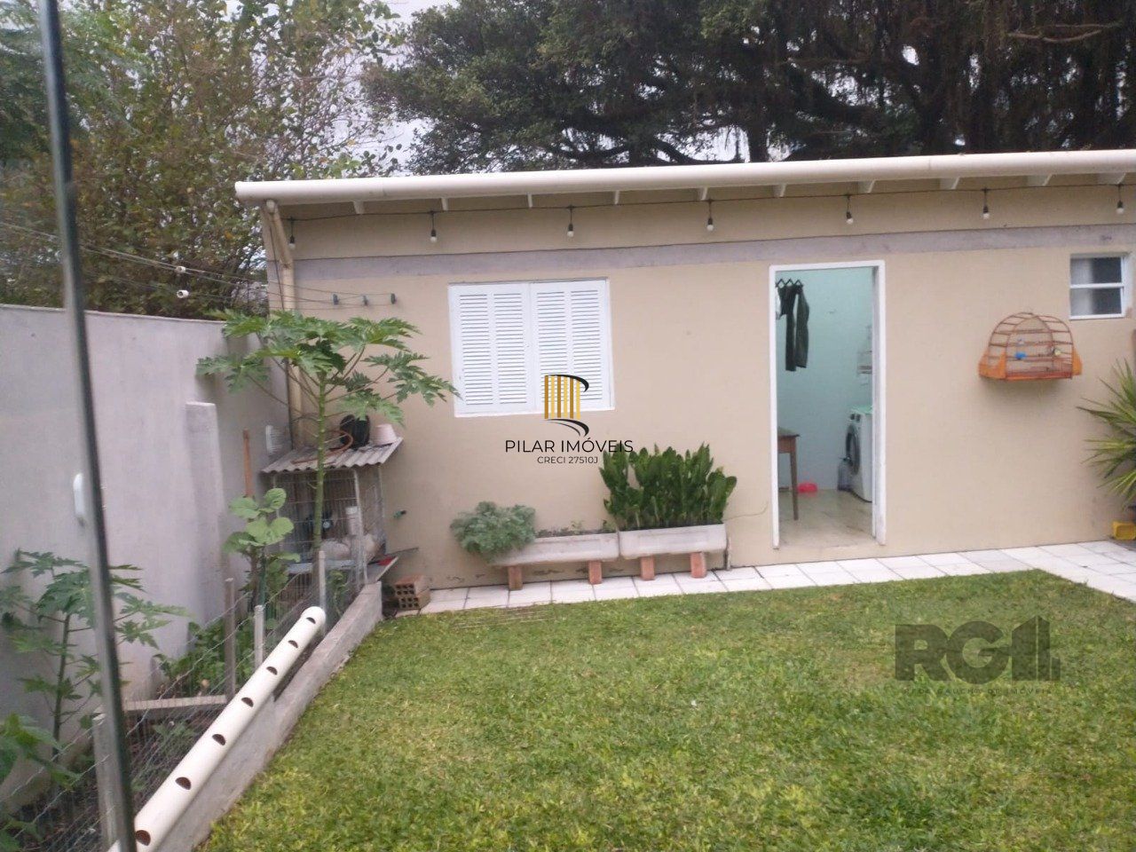 Casa de 155m² com 2 quartos, suíte, 2 vagas de garagem, no bairro Jardim Europa, Porto Alegre/RS