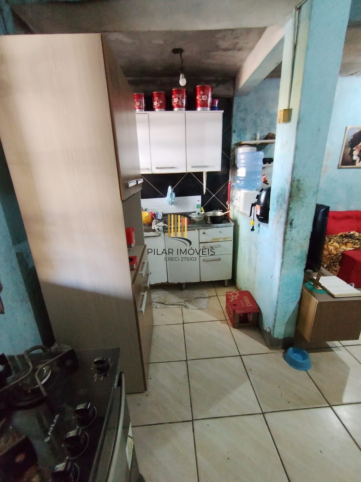 Casa 3 dormitórios no bairro Camaquã