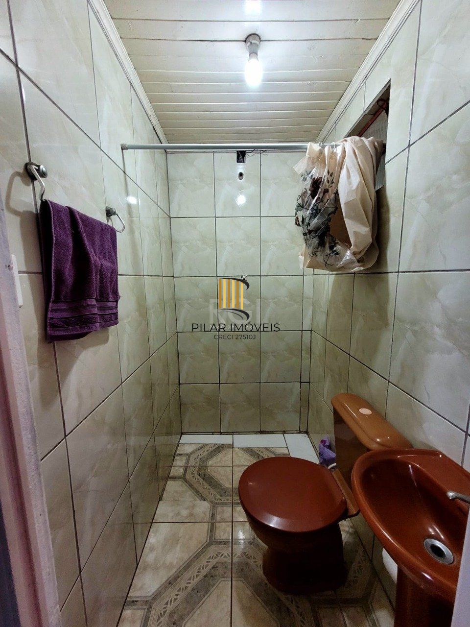 Casa com 3 quartos, 1 suíte, vaga de garagem, varanda, no bairro Hilda, Cruz Alta/RS