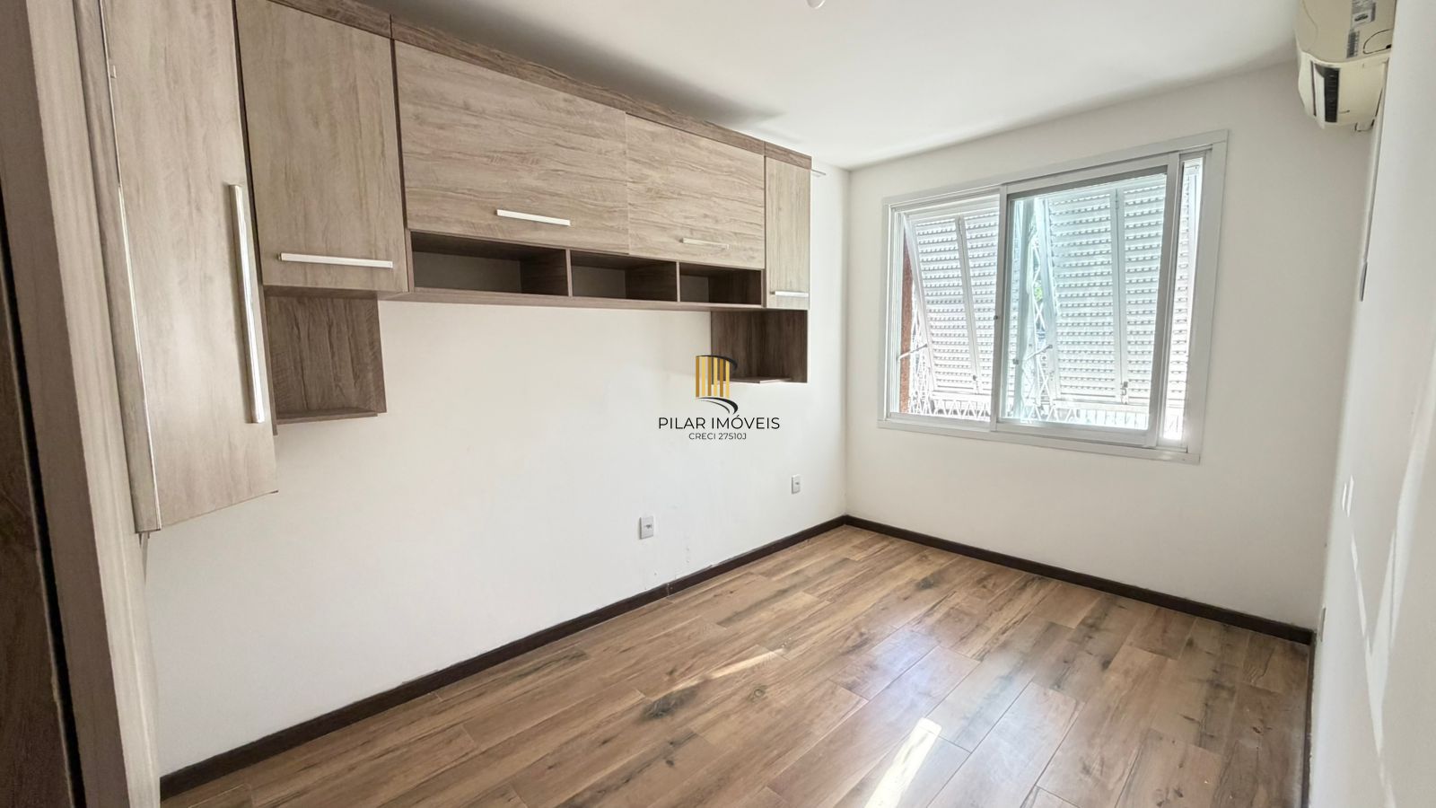 Apartamento de 2 dormitórios com vista para o Marinha no bairro Menino Deus em Porto Alegre/RS