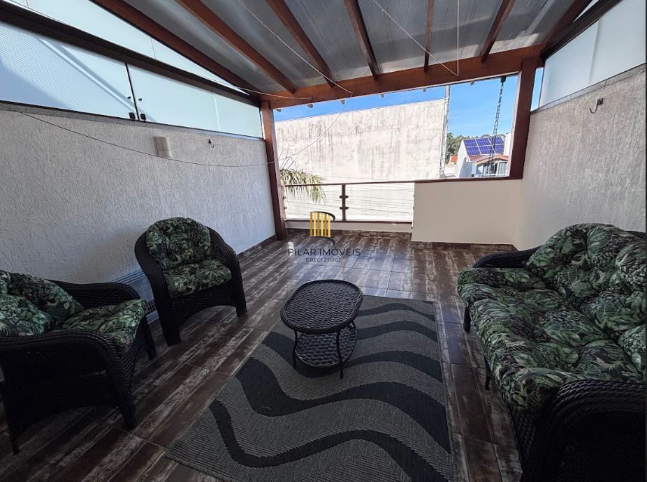 Casa 3 dormitórios no bairro Guarujá